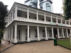 10B Flagstaff House was built in the 1840s with Lippo Centre overhead in Hong Kong Park
